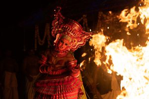 Theyyam performance with fire