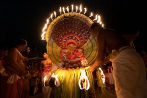 Theyyam performance with fire
